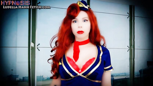 Ludella Hahns Fetish Adventures - Fembot Flight Attendant is on the Fritz